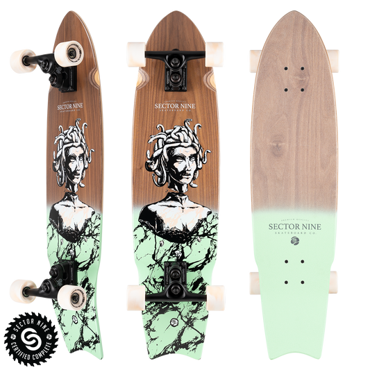 Sector9 Unagi Gorgon Walnut longboard complete, three views with a walnut deck, a statue head graphic, a faded mint tail and cream wheels