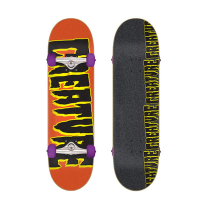 Creature Logo Micro skateboard complete in orange, top and bottom views with black and yellow Creature lettering and purple wheels on a white background